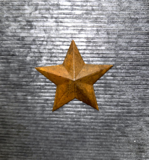 LARGE RUSTY MAGNETIC STAR